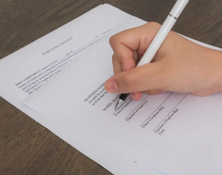 Three people are standing