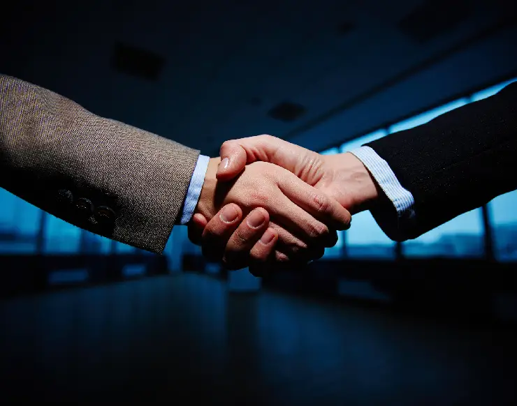 Three people are standing